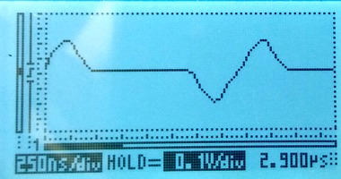 oscilloscope view of an E1 signal distorted by a reflection