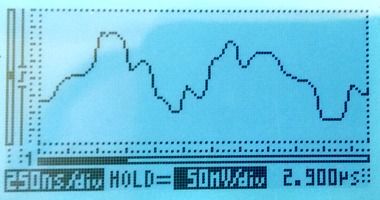oscilloscope view of an E1 signal severely distorted by a reflection